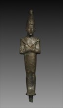 Statuette of Osiris, 664-525 BC. Egypt, Late Period, Dynasty 26 or later. Black copper (?), hollow