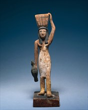 Female Offering Bearer, 2000-1801 BC. Egypt, Middle Kingdom, late Dynasty 11 to early Dynasty 12.