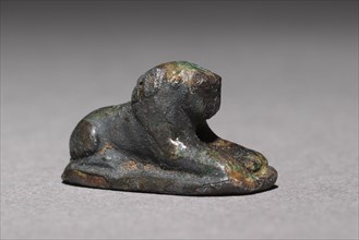 Recumbent Lion Bead, 1980-1801 BC. Egypt, Middle Kingdom, Dynasty 12. Silver foil over a