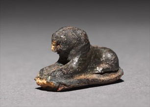 Recumbent Lion Bead, 1980-1801 BC. Egypt, Middle Kingdom, Dynasty 12. Silver foil over a