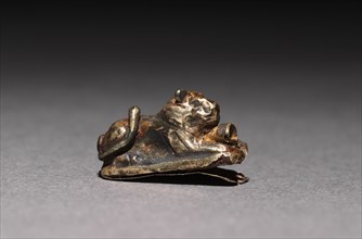 Recumbent Lion Beads, 1980-1801 BC. Egypt, Middle Kingdom, Dynasty 12. Electrum over a clay-bulked