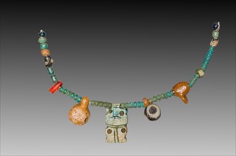 Fragment of a Necklace, 1540-1296 BC. Egypt, New Kingdom, Dynasty 18. Steatite, glass, carnelian,