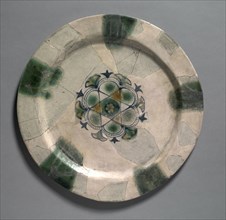 Earthenware Dish Painted Blue with Splashes of Green and Yellow, 830-900. Iraq, Basra, Abbasid