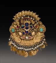Pendant with Two-Armed Blue Deity on a Lotus with Nagas (serpent divinities), 17th Century. Nepal,