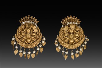 Pair of Earrings with Four-Armed Vishnu Riding Garuda with Nagas (serpent divinities), 1600s or