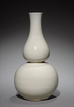 Double-gourd-shaped Bottle: Ding ware, 1368- 1644. China, Ming dynasty (1368-1644). Porcelain;