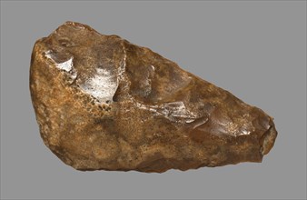 Hand Axe, Lower-Mid Paleolithic. Egypt, EL-Haraga, Paleolithic Period. Dark-brown-colored flint;