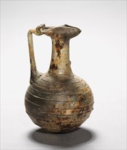 Pitcher with Handle, 100-400. Roman, Eastern Mediterranean, 2nd Century, or later. Glass; overall: