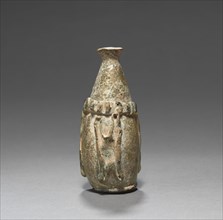 Bottle, 7th-9th Century. Early Islamic, Eastern Mediterranean. Glass; overall: 10.5 cm (4 1/8 in.).