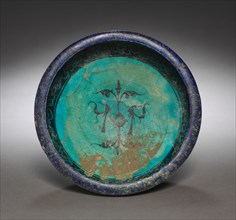 Bowl, early 13th Century. Iran, Kashan, Seljuk Period. Earthenware with underglaze-painted and