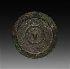 Mirror, Han dynasty (206 BC-AD 220). China, Han dynasty (202 BC-AD 220). Bronze; diameter: 19.1 cm