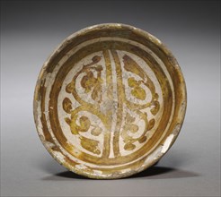 Bowl, 11th Century. Egypt (Fustat), Fatimid Period. Earthenware with luster-painted design;