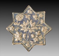 Wall Tile with Lotus Blossom, c. 1300-1350. Iran, probably Sultanabad. Fritware with molded and