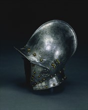 Burgonet with Hinged Cheek Pieces, c. 1560 - 1570. North Italy, 16th century. Steel with brass