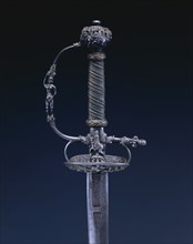 Small Sword, c.1650-1660. Netherlands, 17th century. Steel, wood, copper wire; chiseled hilt;
