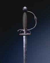 Small Sword, c. 1650-1670. France, 17th century. Steel, iron, silver inlay; wood and brass wire;
