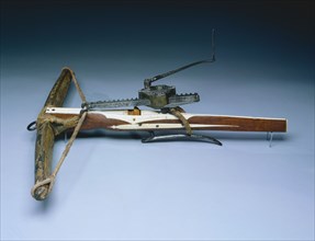 Crossbow, c. 1460-1470. Germany, 15th century. Wood (walnut?) inlaid with bone; horn; iron and