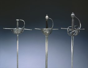 Rapier, c. 1650. Spain, 17th century. Steel, pierced and chiseled, leather and wood grip; diameter: