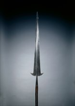 Partisan, c. 1550-1600. Italy, 16th century. Steel, etched; oval wood haft; overall: 236.2 cm (93