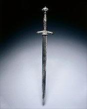 Dagger, early 1600s. Italy, early 17th century. Steel, perforated blade; openwork grip; overall: 46