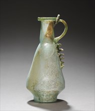Jug, 100-300. Cyprus, 2nd-3rd Century. Glass; overall: 13.4 cm (5 1/4 in.).
