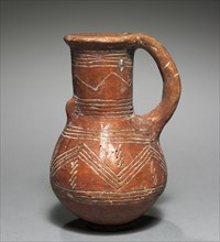 Jug, 2000-1800 BC. Cyprus, Early Cypriot III-Middle Cypriot II. Red ware; diameter: 4.3 cm (1 11/16