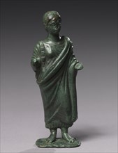 Statuette of Sacrificing Woman, 600-480 BC. Italy, Etruscan, Archaic period. Bronze; overall: 19.1