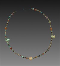 Necklace with Amulets, 1980-1801 BC. Egypt, Middle Kingdom, mostly Dynasty 12. Faience and various