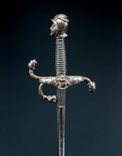 Rapier, c. 1600. Germany, Solingen, early 17th Century. Russeted and gilded steel with inlaid