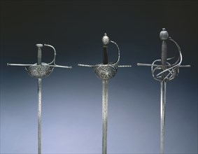 Cup-Hilted Rapier, c.1610- 30. Italy, Milan?, 17th century. Steel, pierced, chased and chiseled;