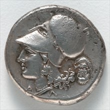Stater:  Athena (reverse), 350-338 BC. Greece, Corinth, 4th century BC. Silver; diameter: 2.2 cm