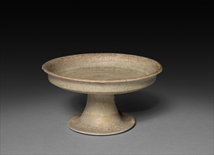 Stem Dish, 7th-8th Century. China, Tang dynasty (618-907). Glazed cream-white stoneware; diameter:
