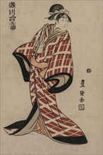 Segawa Michinosuke Wearing a Padded Plaid Robe, c. 1805. Utagawa Toyokuni (Japanese, 1769-1825).