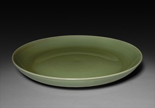 Platter, 1400s. China, Ming dynasty (1368-1644). Porcelain with celadon glaze; diameter: 58.4 cm
