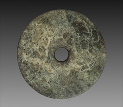Ceremonial Disk (Bi), 3300-2200 BC. East China, Neolithic period, Liangzhu culture (3300-2200 BC).
