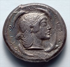 Tetradrachm: Female Head (reverse), 485-478 BC. Greece, 5th century BC. Silver; diameter: 2.4 cm
