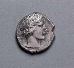 Tetradrachm: Apollo (obverse), 466-422 BC. Greece, 5th century BC. Silver; diameter: 2.6 cm (1 in.)