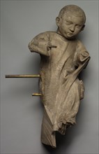 Figure of a Child, 1300s. France, 14th century. Stone; overall: 64.8 x 30.5 cm (25 1/2 x 12 in.)