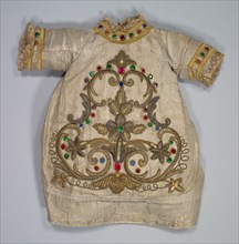 Baby's Robe, 17th century. Spain, 17th century. Cloth embroidererd in gold and silver; overall: 35