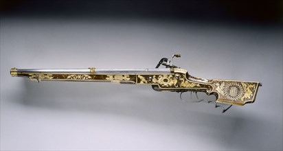 Wheel-Lock Rifle, 1618. Germany, Bavaria (?), 17th century. Steel, brass, walnut stock inlaid with