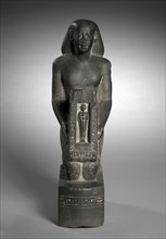 Naophorous Statue of the Finance Officer and Overseer of Fields, Horwedja, 521-486 BC. Egypt, Late