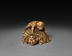 Demon Covering Shoki, 19th century. Japan, Edo Period (1615-1868). Ivory; overall: 3.2 cm (1 1/4 in
