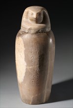 Canopic Jar with Falcon's Head, 664-525 BC. Egypt, Late Period, Dynasty 26. Travertine; diameter: