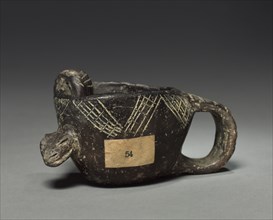 Dish with Handle, before 1921. Colombia. Pottery; overall: 7 x 12.8 cm (2 3/4 x 5 1/16 in.).