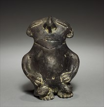 Figurine, before 1921. Colombia. Pottery; overall: 16 x 11.5 x 9.5 cm (6 5/16 x 4 1/2 x 3 3/4 in.).