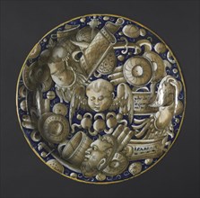 Plate with Putto, Mask, and Trophies, c. 1440-1460. Italy, Castel-Durante, 15th century. Tin-glazed