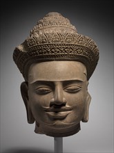 Head of a Deity or a Deified King, mid 900s. Cambodia, Koh Ker, Reign of Jayavarman IV, 928-941.