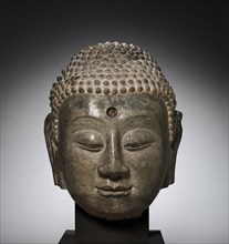 Head of Buddha, c. 570. China, Hebei province, northern Xiangtangshan caves, South cave, Northern