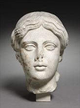 Head of a Woman, 1-15. Italy, Roman, early 1st Century. Marble; overall: 21 cm (8 1/4 in.).
