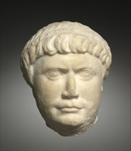 Head of Trajan, 100-200. Italy, Roman, 2nd Century. Marble; overall: 9 cm (3 9/16 in.).